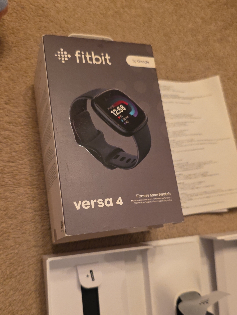 fitbit Black Smartwatch with Black Silicone Band and Charger